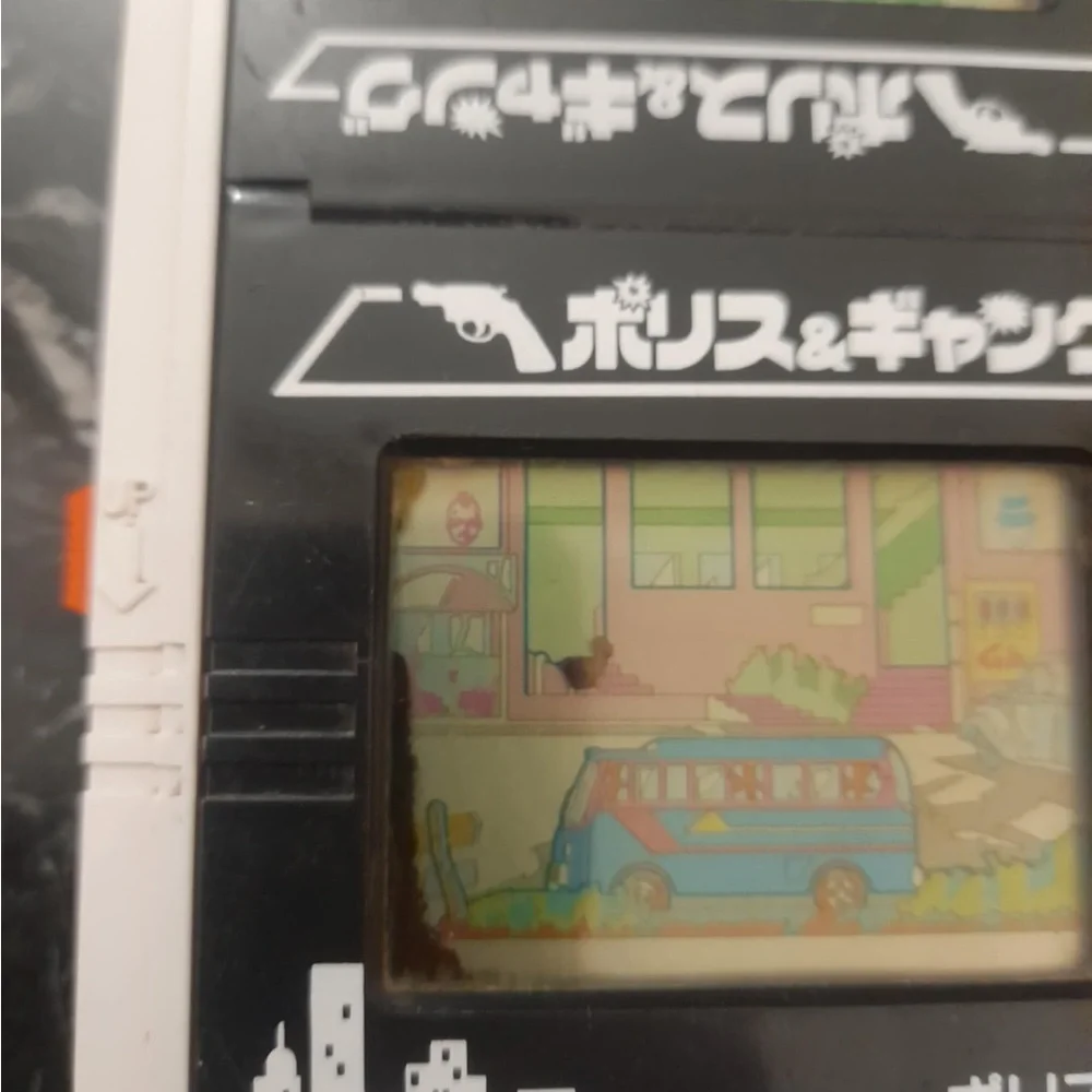 LSI BANDAI ELECTRONICS LCD DOUBLE PLAY POLICE & GANG MADE IN JAPAN 1984